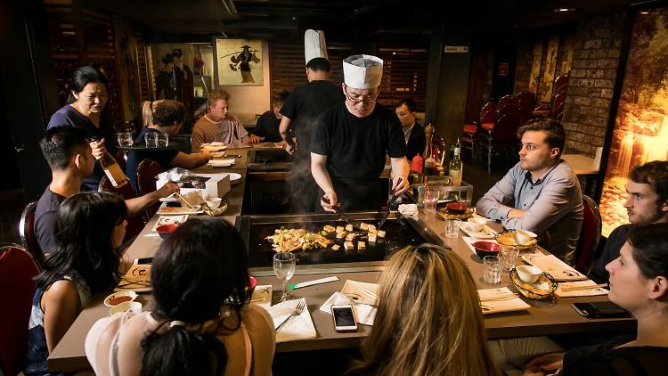 Chef cooking infront of customers at I Chi Ban Teppanyaki