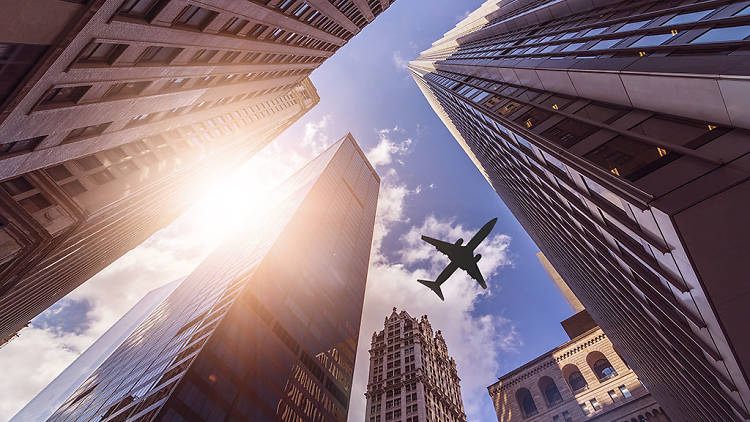 Plane flying over NYC