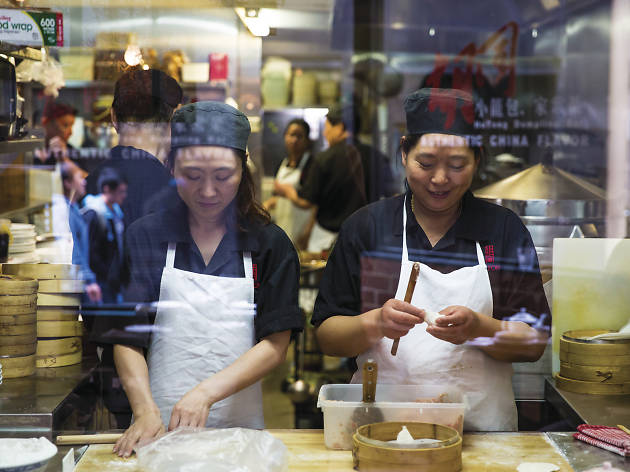 Chefs prepare food at Hutong Dumpling Bar Hutong Dumpling Bar, Market Lane, Melbourne