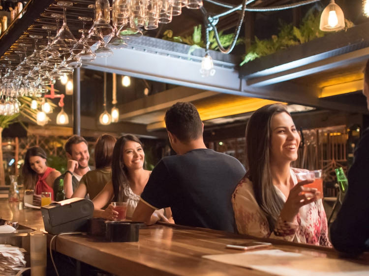 People having drinks at a bar