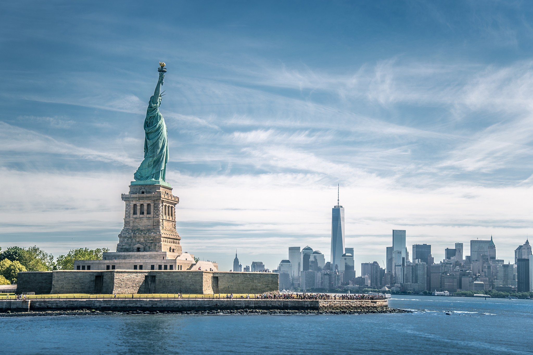 new york statue of liberty and city night