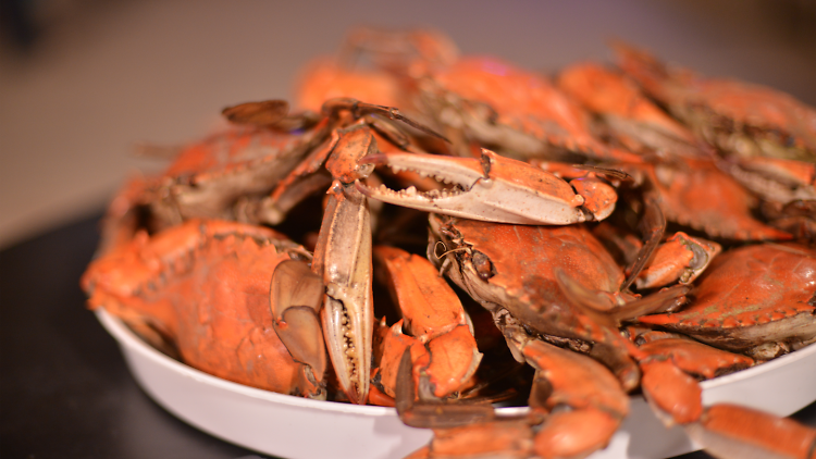 A bowl of boiled red crabs