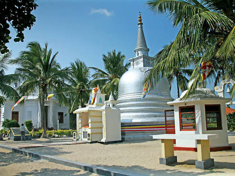 Take a boat to Nainativu in Jaffna and visit the Nagadeepa Purana Viharaya,