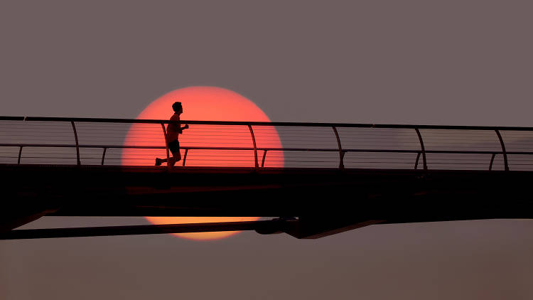 Runner on Millennium Bridge