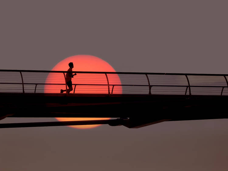 Runner on Millennium Bridge