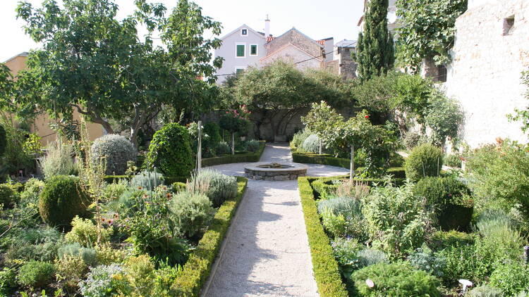 Visit the gardens around St Lawrence Monastery