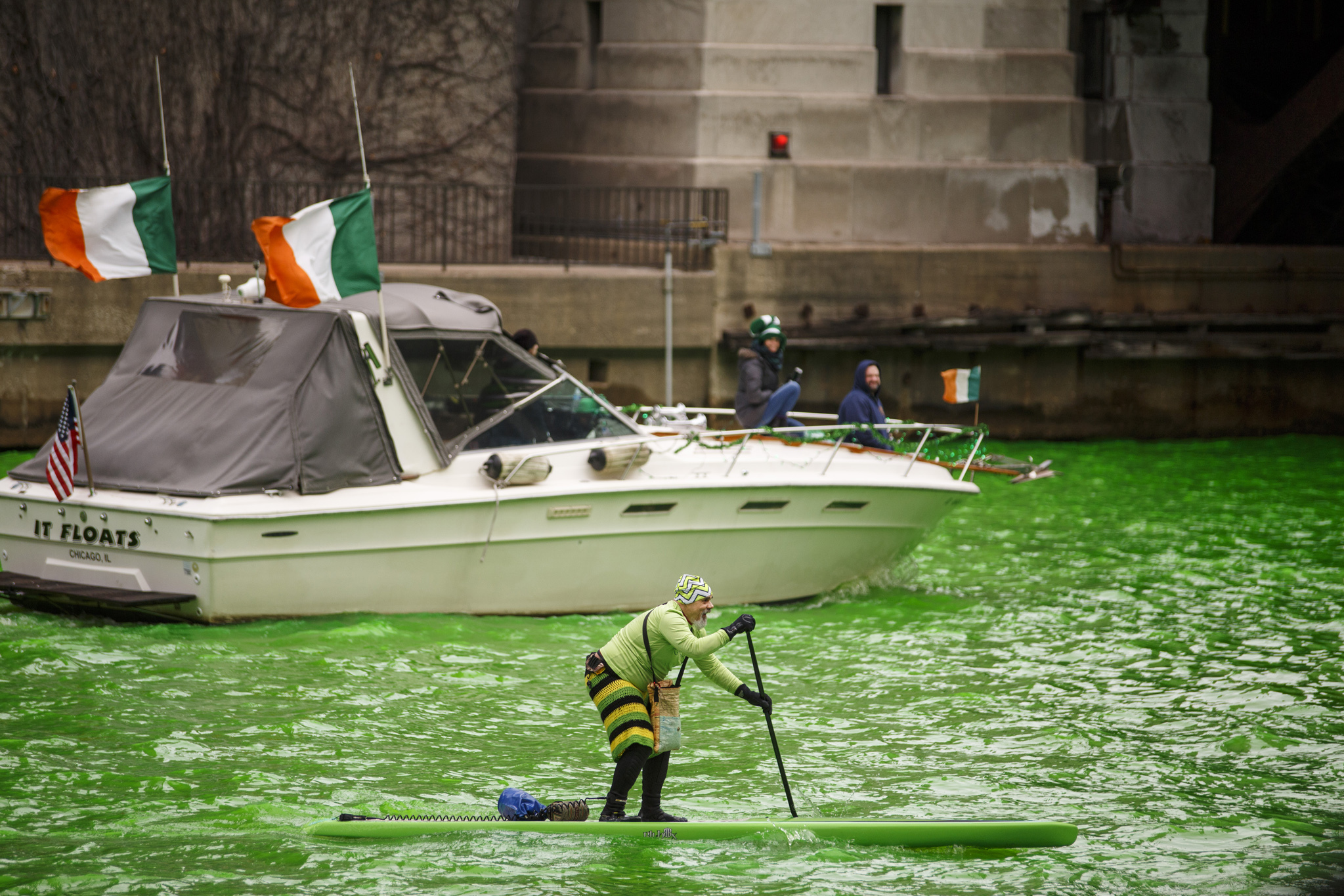 LISTEN: Partnership between plumbers union, boat tour turns Chicago River  green for St. Patrick's Day - Medill Reports Chicago