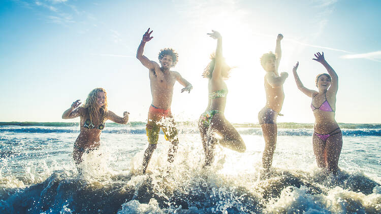 People jumping in the water