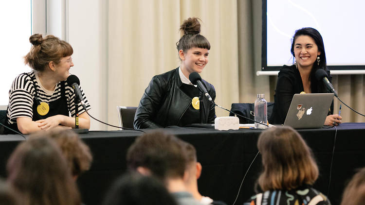 Three women on a panel about podcasts