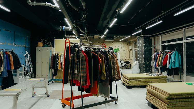 Shop for eclectic fashion in a love hotel district