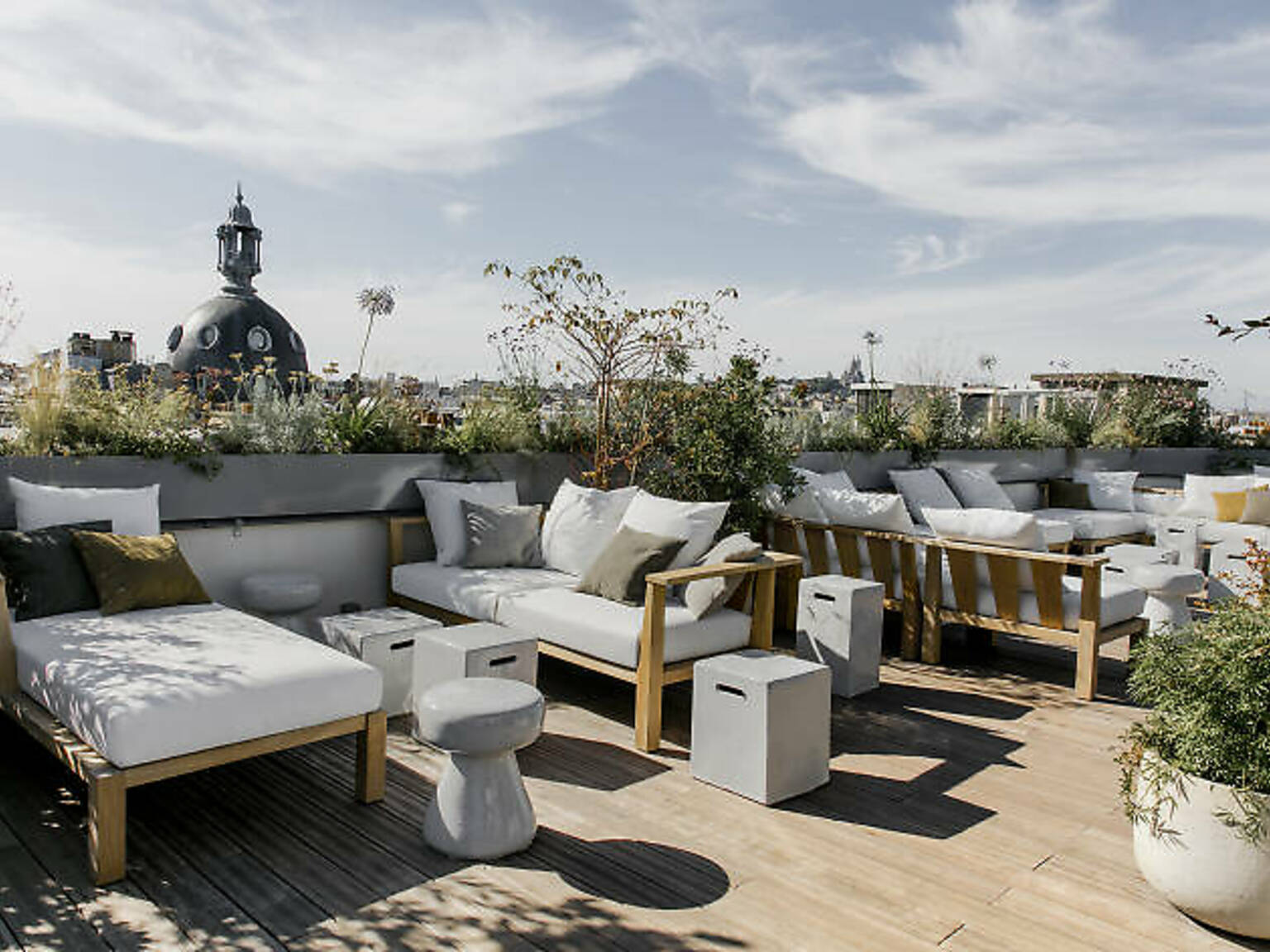 11 Best Rooftop Bars in Paris For Eiffel Tower Views and More