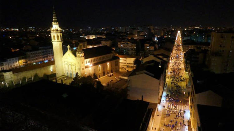 Admire a panoramic view  of the city from the top of a church