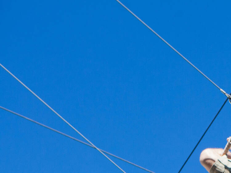 People do a catch on the trapeze.