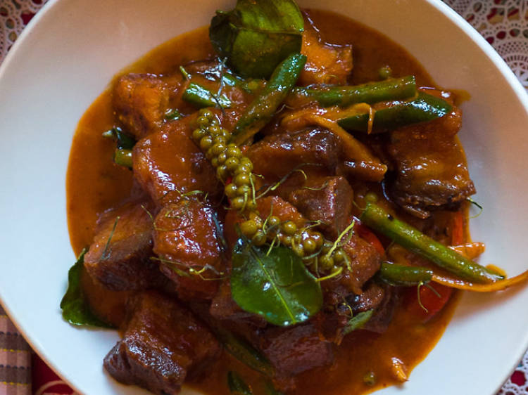 Braised pork belly with dry red curry at Magic Mountain Saloon