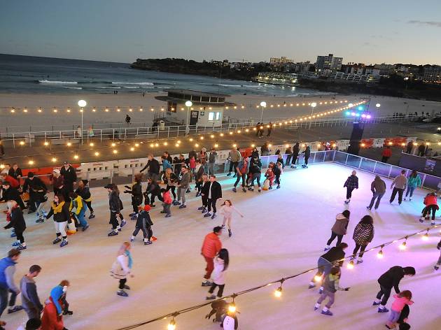 People ice skating by Bondi beach. 