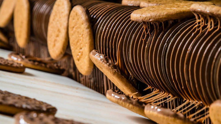 See how chocolate digestives are made at a London biscuit factory