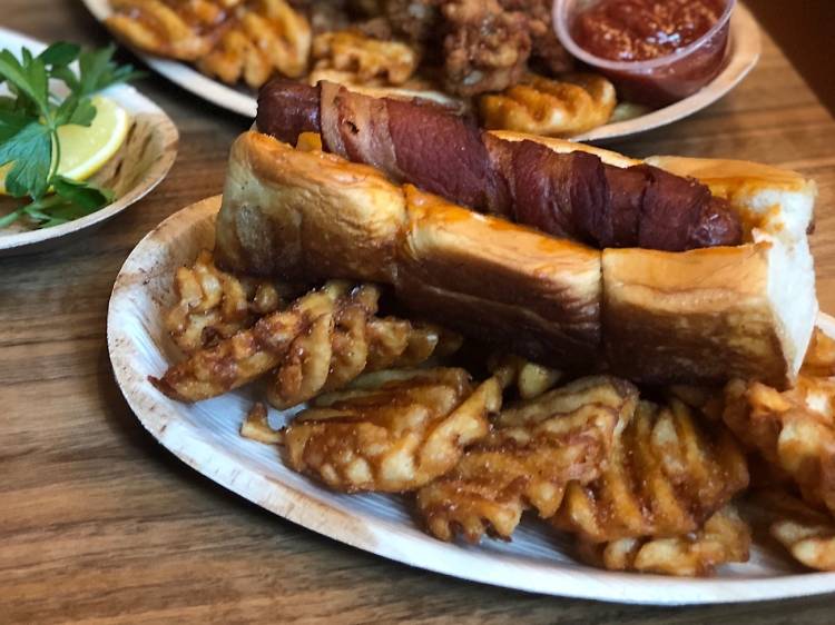 Bacon-wrapped hot dog at Spicoli’s Clam Bar