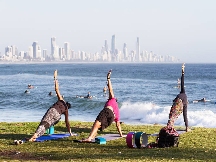 Yoga class by the beach