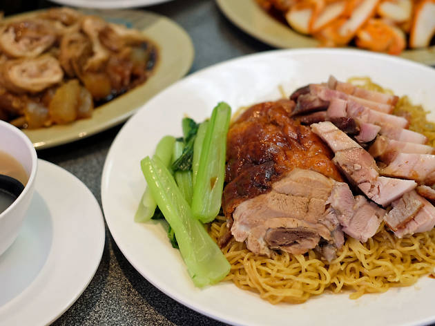 No 1 BBQ House A plate of roast meats on noodles