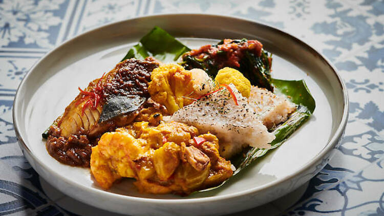 Nasi tekan with assorted curries