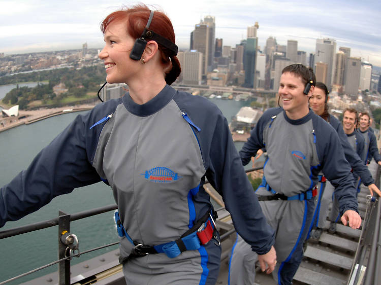 People climbing the Sydney Harbour Bridge.