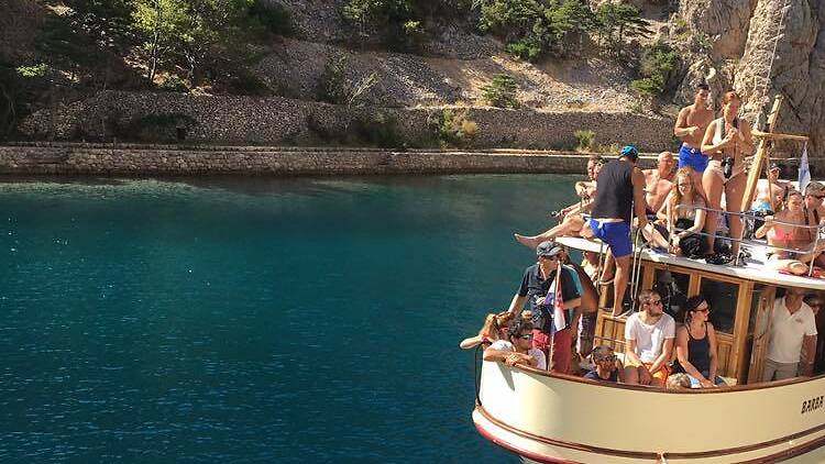 Discover Rab island in a glass-bottom boat