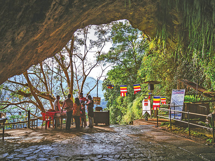 Visit the Batatotalena Cave Temple in Kuruwita. 