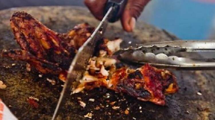 Feast on jerk chicken where it all began in Boston Bay