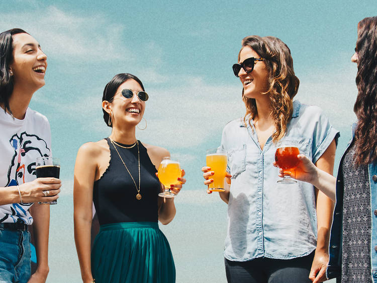 Generic friends outdoors with beer