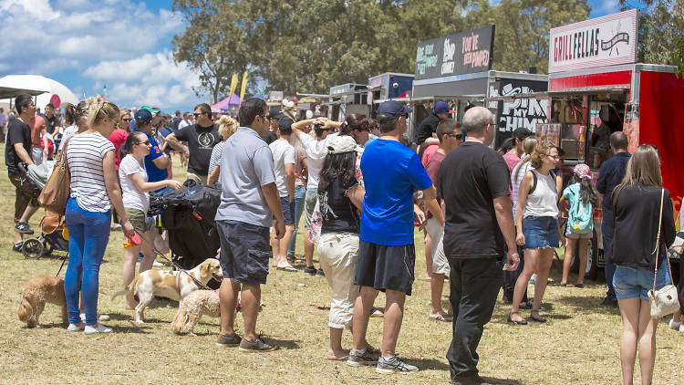 People lined up at the food stalls for Park Feast.