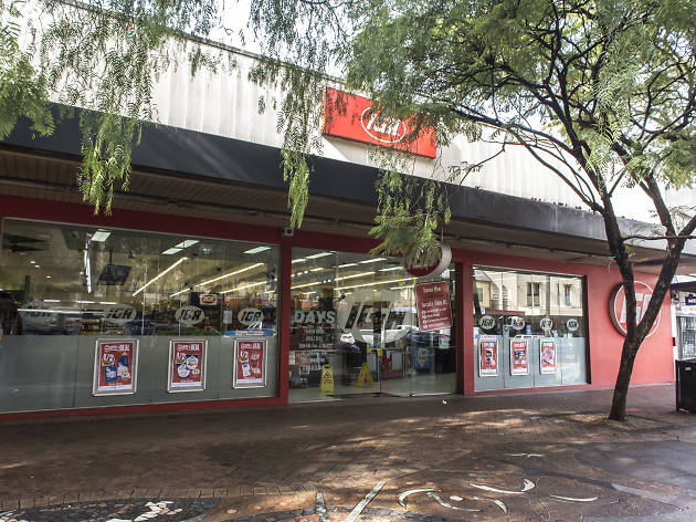 IGA Waterloo Storefront of supermarket with tree