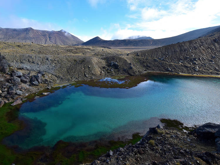 Be mesmerised by blue and emerald lakes from the top of a volcano