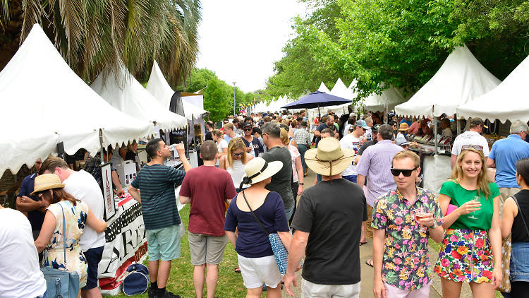 People walk through the stalls at the festival.