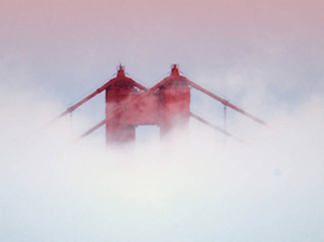 Golden Gate Bridge Tower covered in fog Golden Gate Bridge Tower covered in fog