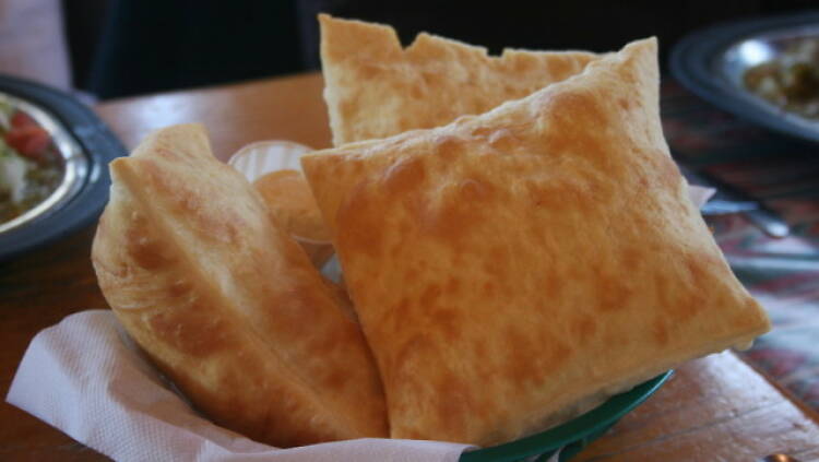 Eat posole and sopaipillas at Tia Sophia's 