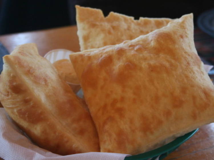 Eat posole and sopaipillas at Tia Sophia's 