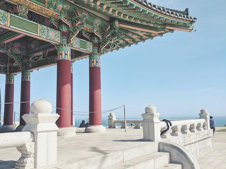 Fly a kite by the Korean Bell of Friendship