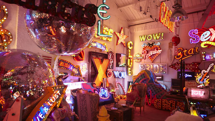 Bathe in neon light at God’s Own Junkyard