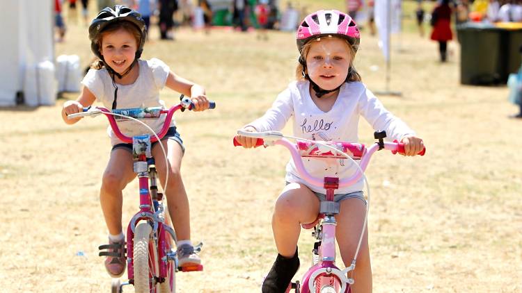 The Big Adventure kids riding on bicycles