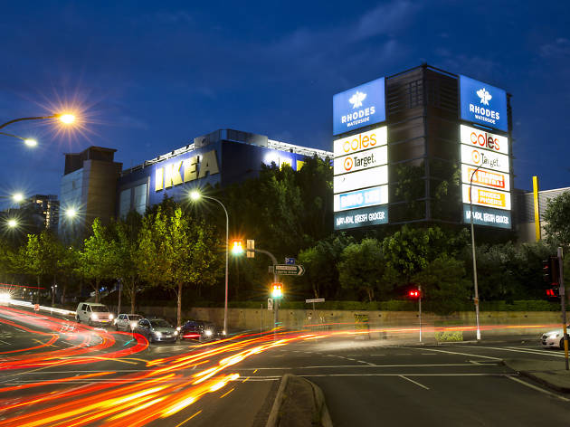 Rhodes Waterside shopping centre Picture of the outside of the mall at nighttime.