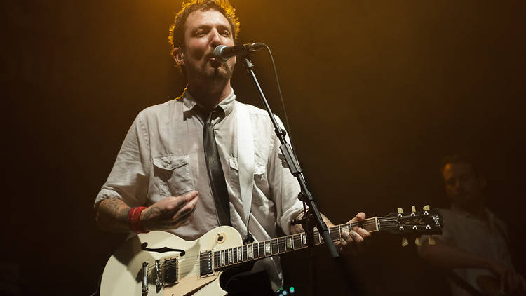 Frank Turner on stage performing with Frank Turner and the Sleeping Souls 