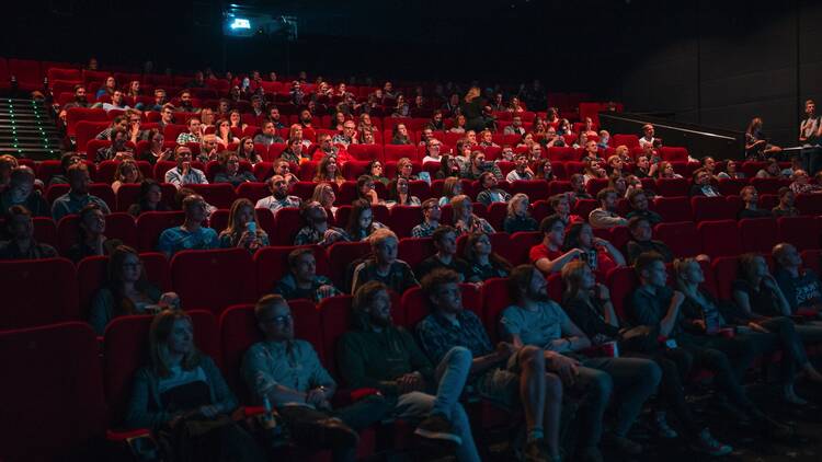 People watching a movie in a cinema 