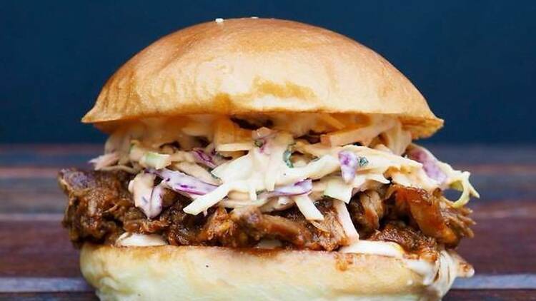 burger with pulled pork and slaw