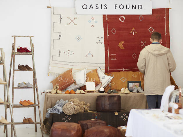 Man looking at shop items.