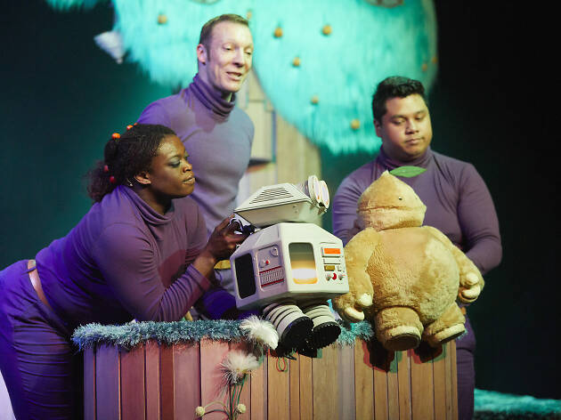 Beep Actors and robot puppets on a stage.