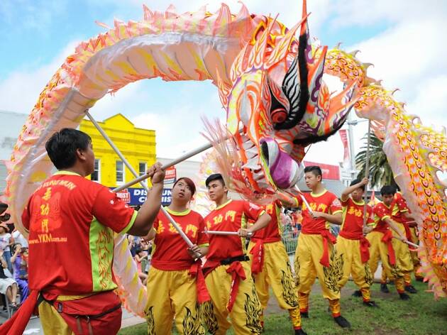 Hurstville Lunar New Year Festival People dancing in dragon costume.