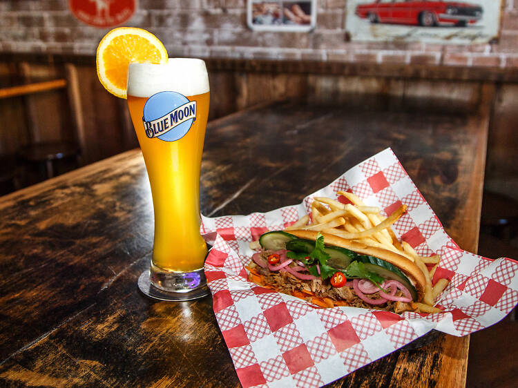 A banh mi and a Blue Moon beer