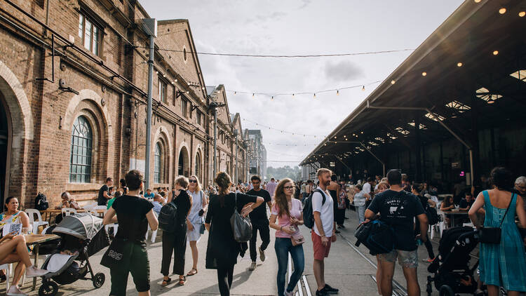 People walking around at Carriageworks Summer Night Markets