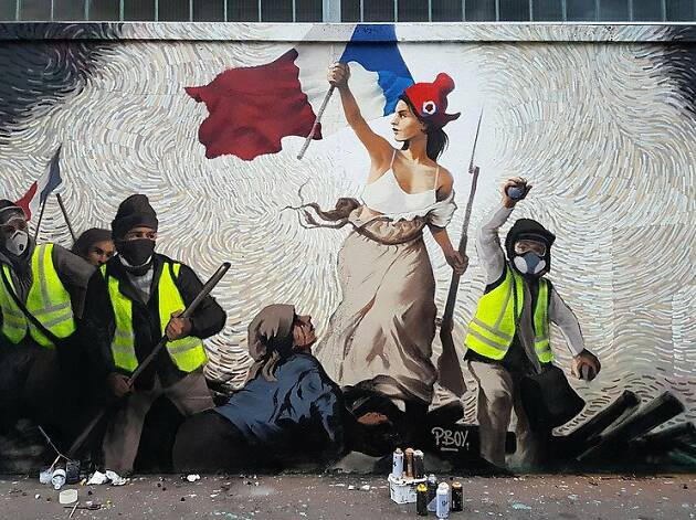 Une fresque street art, inspirée de la Liberté guidant le peuple, hommage aux gilets jaunes Une fresque street art, inspirée de la Liberté guidant le peuple, hommage aux gilets jaunes