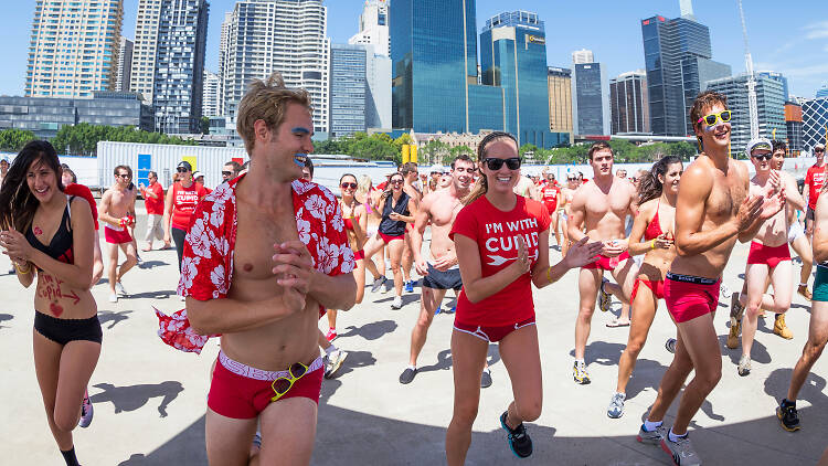 People running in their fun run costumes.